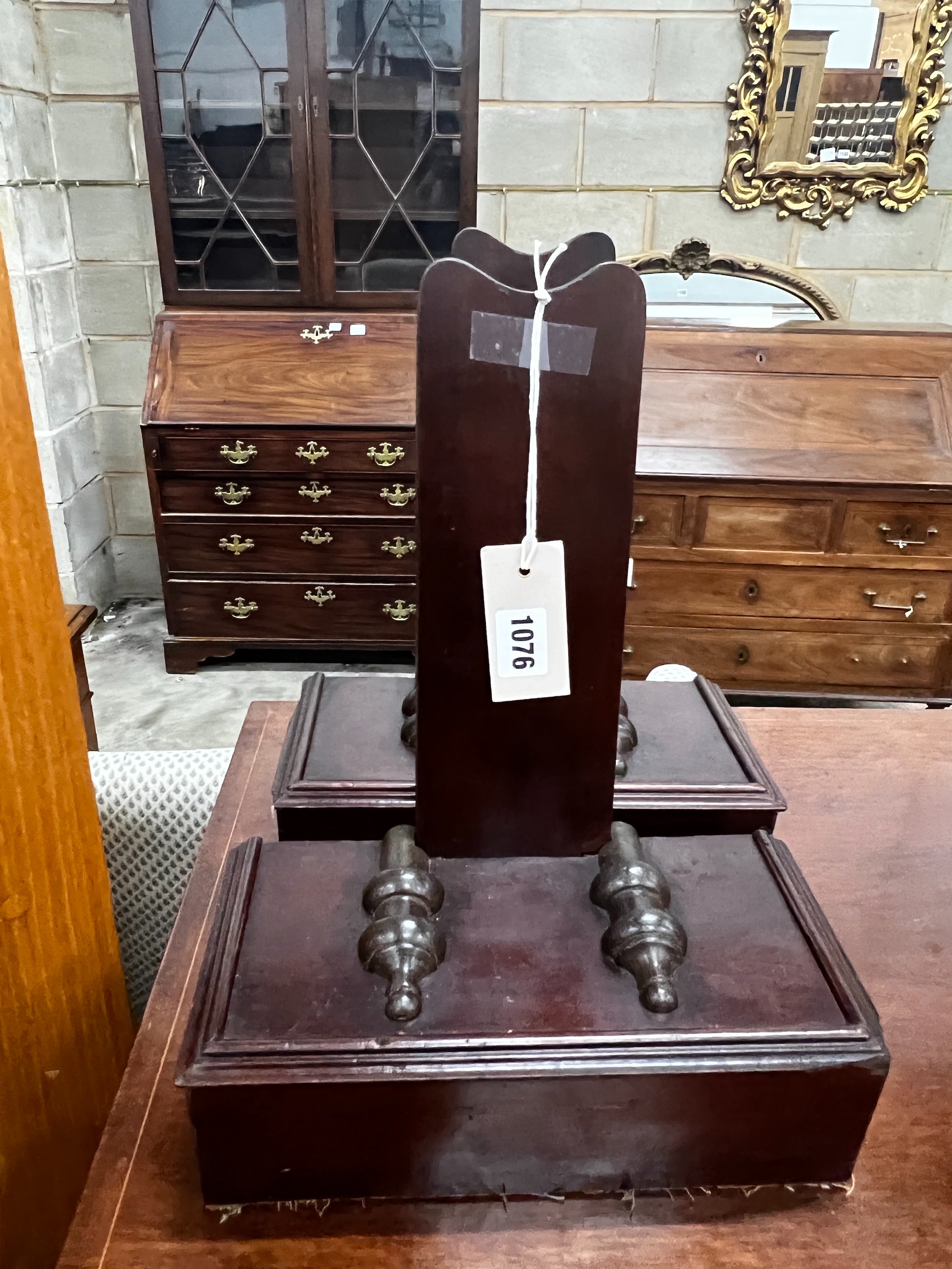 A pair of Gillow style mahogany plate stands, width 27cm, depth 13cm, height 34cm